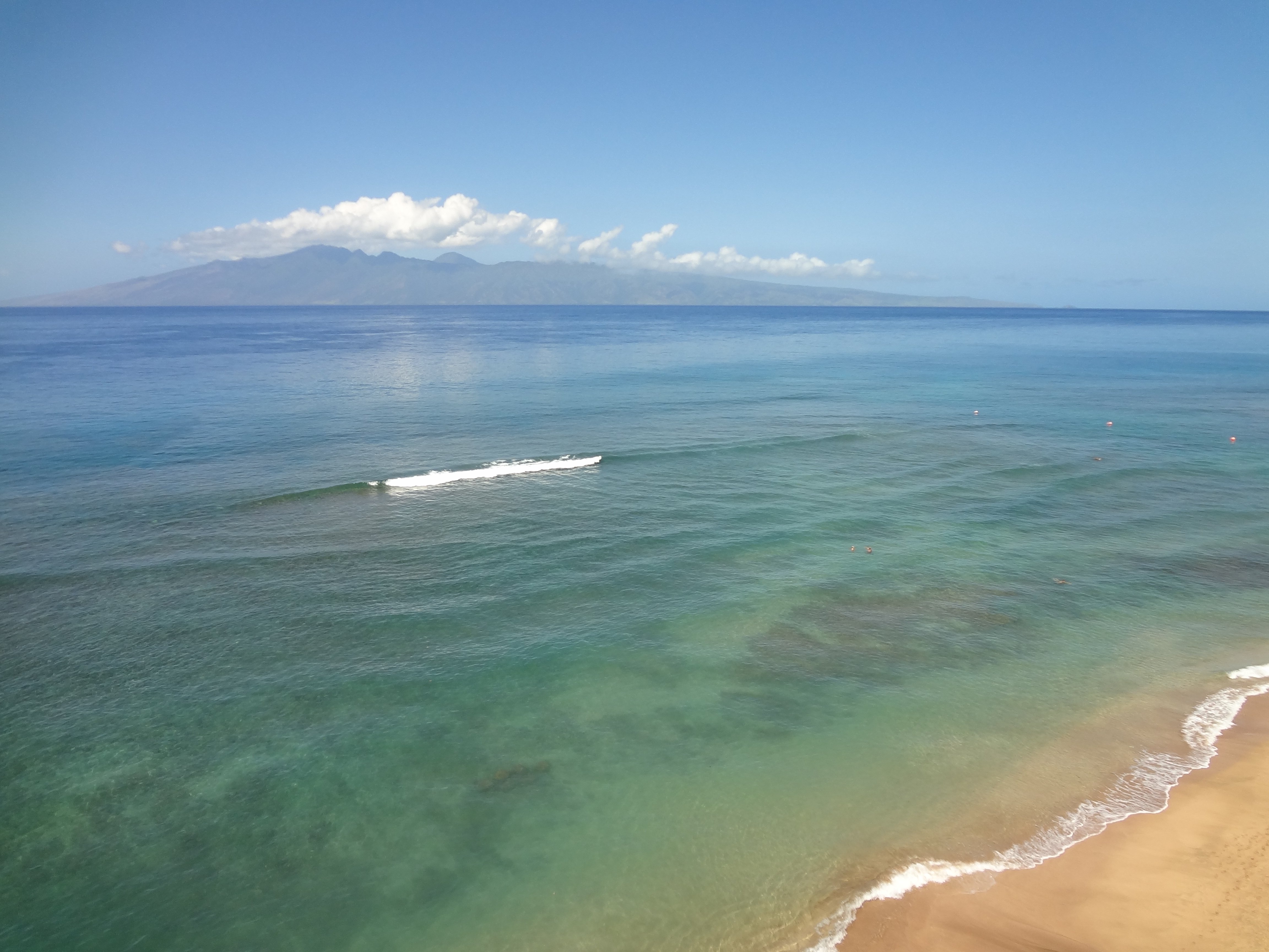 Maui Kai 806 8th floor view of Molokai island from oceanfront lanai, panoramic ocean vistas