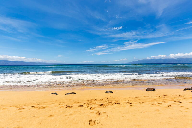 Maui Kai 806 kitchen with island style decor and ocean views, fully equipped for vacation cooking