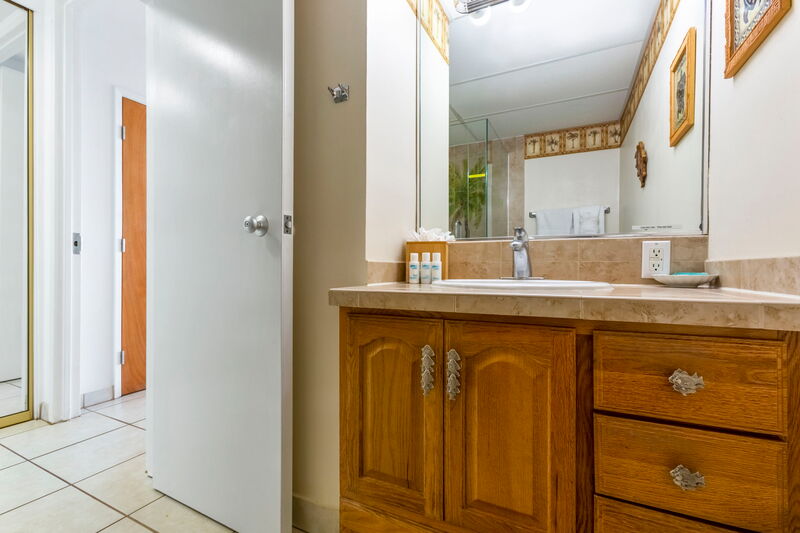 Maui Kai 806 living area with ocean views and comfortable seating, perfect for relaxing in paradise